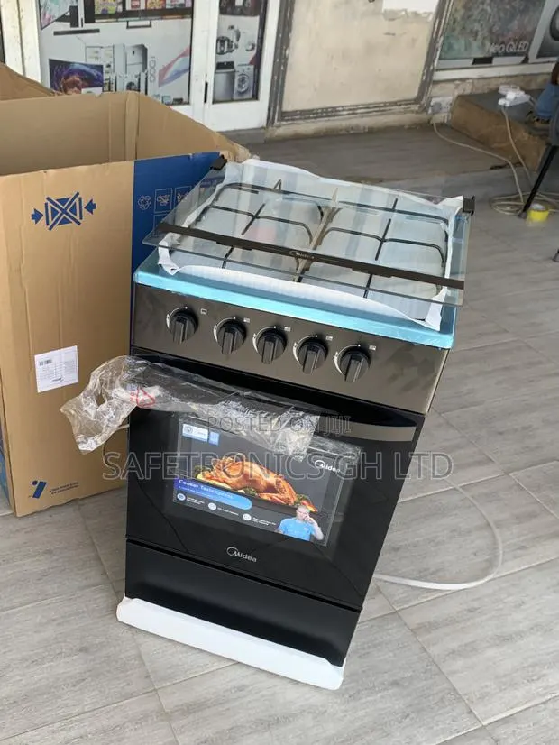 Grab Elegant 50x50 Black Midea 4-Burner Gas Cookers · Photo 1