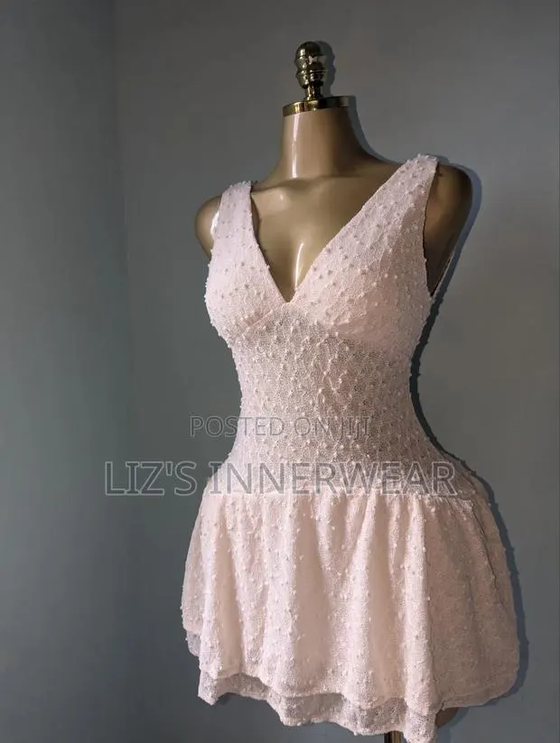 Knitted Flirty Silhouette Dress · Photo 1