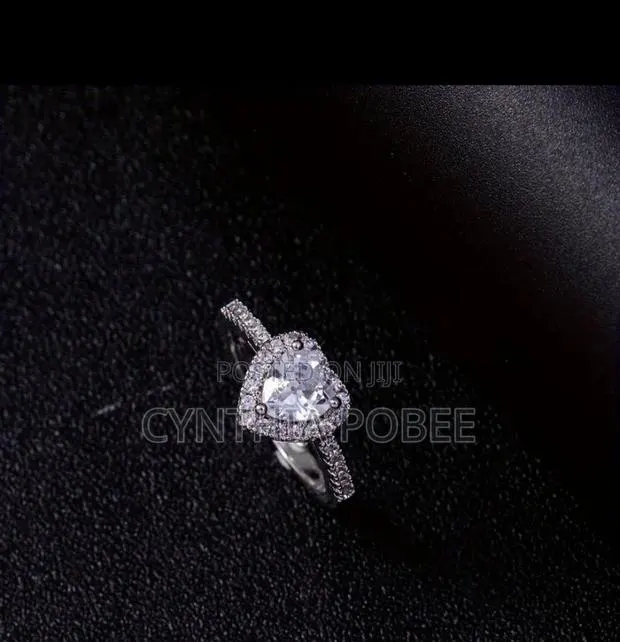 Silver Heart Shaped Promise Ring · Photo 1