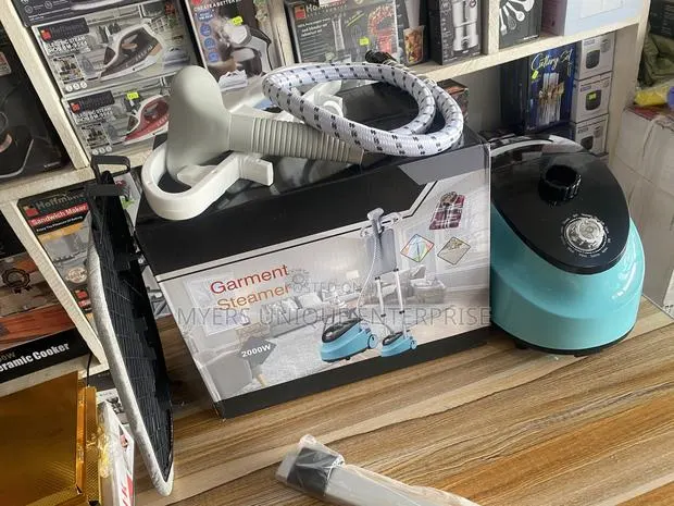Garment Steamer With Stand for Easy and Stress Free Ironing · Photo 1