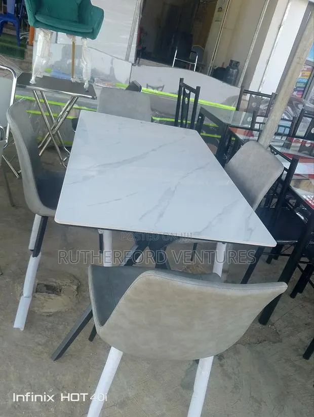 Marble Dining Table and Four Chairs · Photo 1