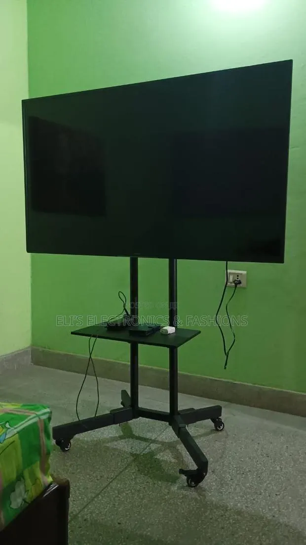 Modern Tv Trolley With Shelf 32”-70” · Photo 1