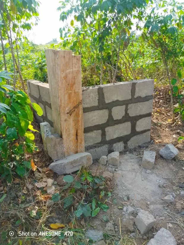 Corner Wall to Protect Your Land · Photo 1