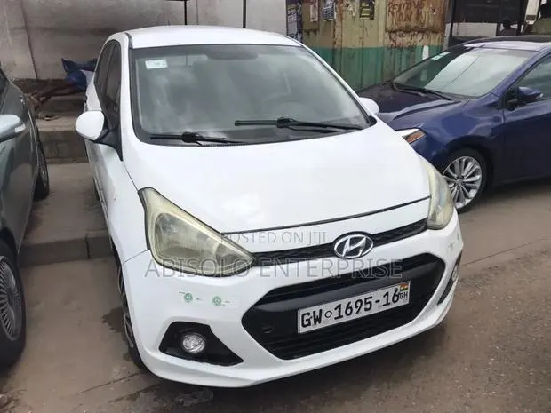 Hyundai Xcent 2015 White · Photo 1