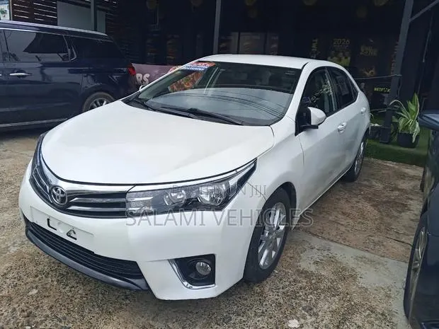 Toyota Corolla 2015 White · Photo 1