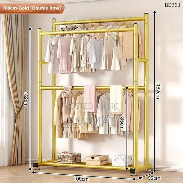 Modern Gold Freestanding Garment Rack With Double Rod, Shelves · Photo 1