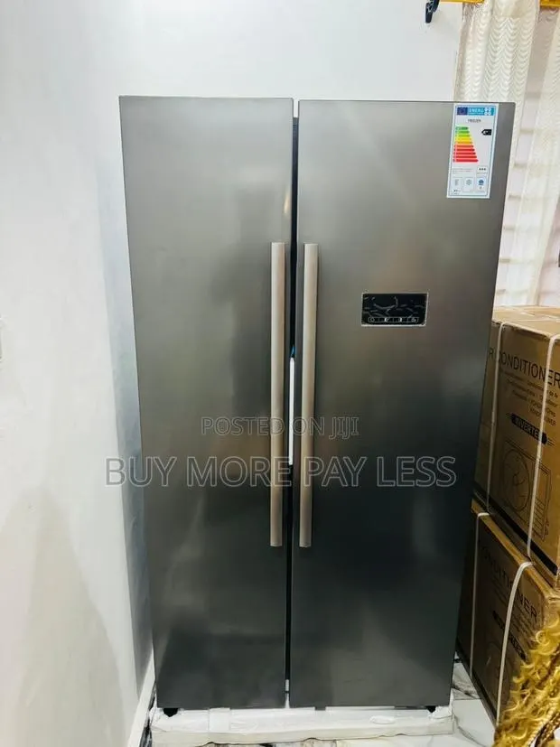 Stainless Steel or Brushed Metal Side-by-Side Refrigerator · Photo 1