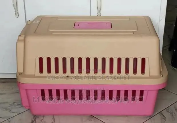 Medium Plastic Dog Cage · Photo 1