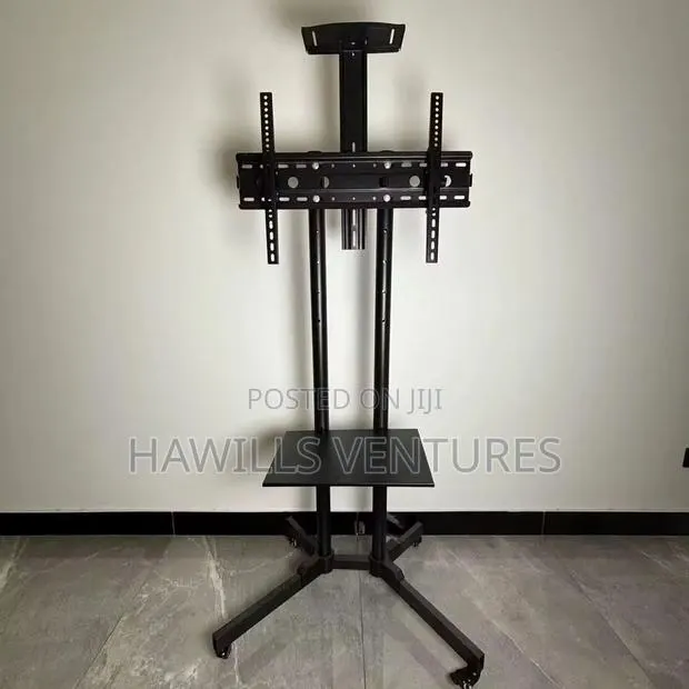 Tv Stand Featuring a Heavy- Duty Steel Frame to Hold Screen 32-70". · Photo 1