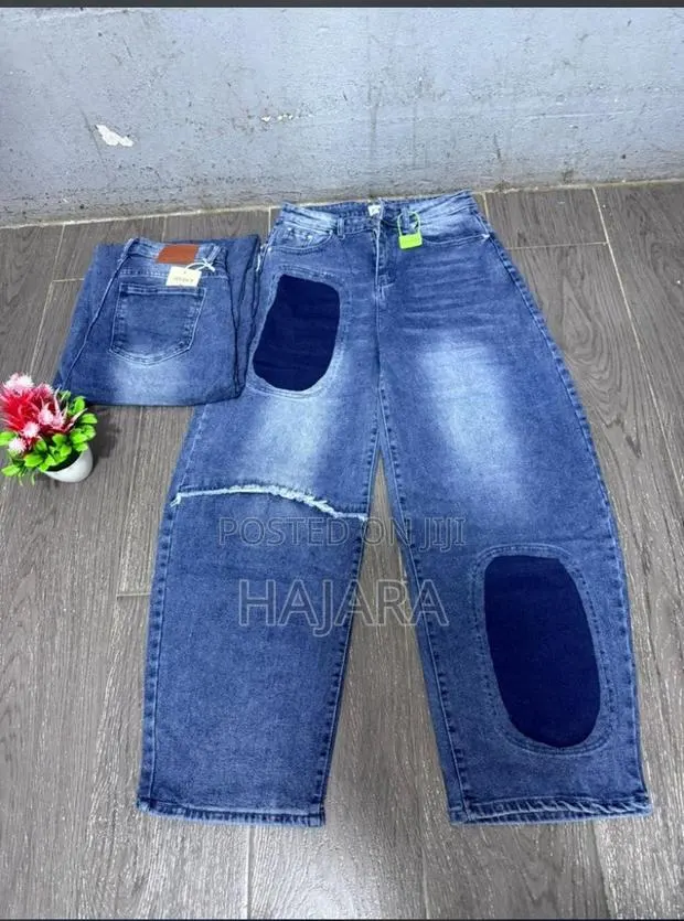 Trendy Flared/Balloon Leg Denim Jeans With Layered Waist Accent · Photo 1
