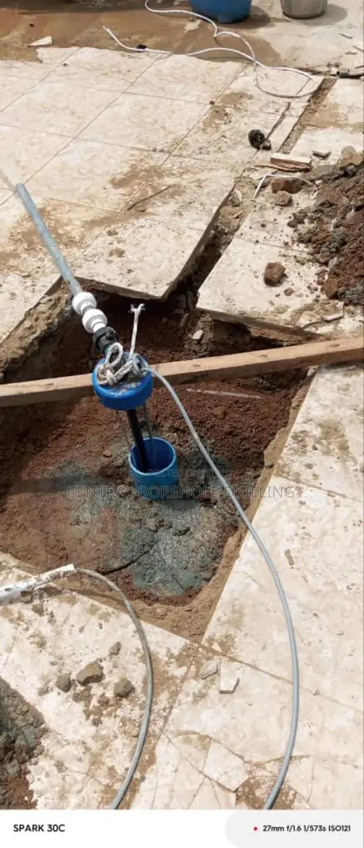 Borehole and Installation of Pump · Photo 1