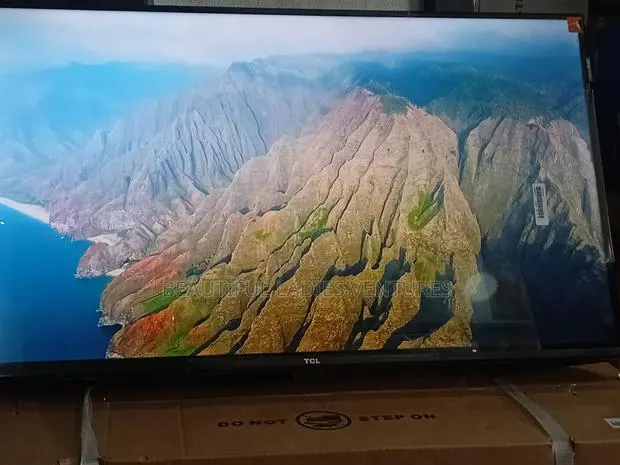TCL 32” Home Cinema Tv With Immersive Audio · Photo 1