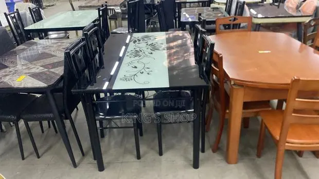 A Glass Dining Set · Photo 1
