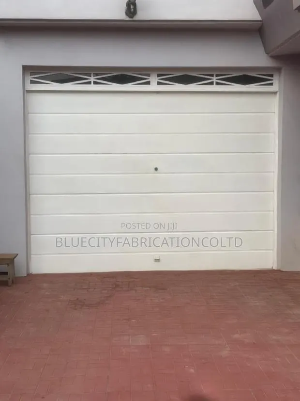 Automatic Garage Door With Smart Motor · Photo 1
