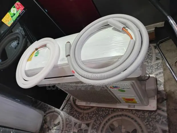 Rainbow 1.5hp Ac Unit - White ,Compact Window Model. · Photo 1