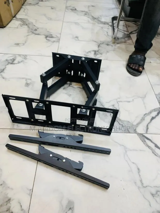 Elevate Your Tv Watch Another Level With Tv Mount 32”-80” · Photo 1