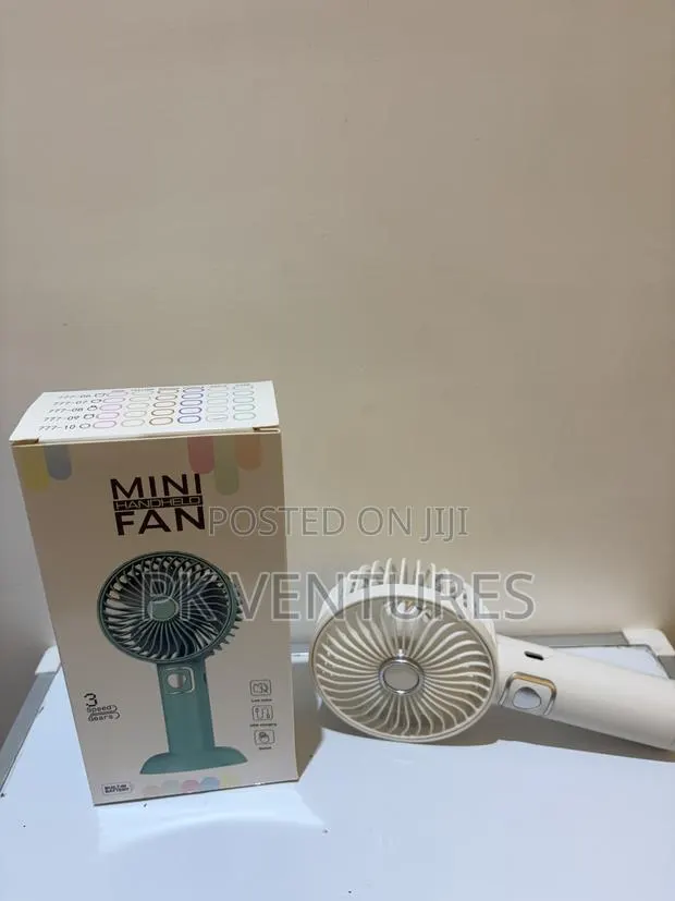 3 Speed Hand Held Mini Fan · Photo 1