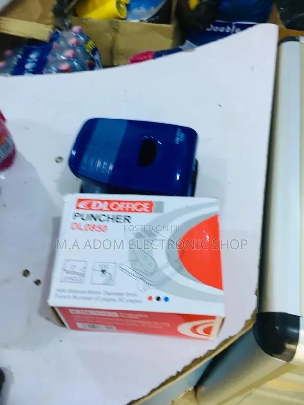 The Office Puncher: Smooth, Clean, Efficient · Photo 1