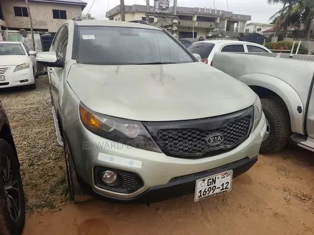 Kia Sorento 2012 Gold · Photo 1