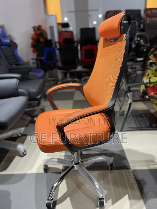 Vibrant Orange Executive Ergonomic Swivel Chair · Photo 1