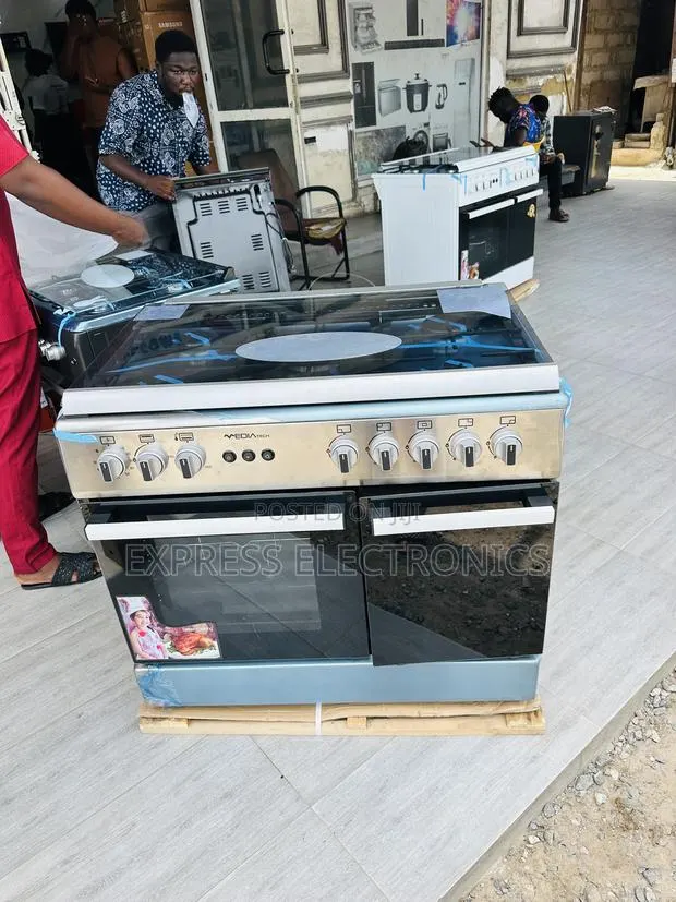 Less Expensive Gas Cooker Oven Sliver Rotisserie 5burner 60/90 · Photo 1