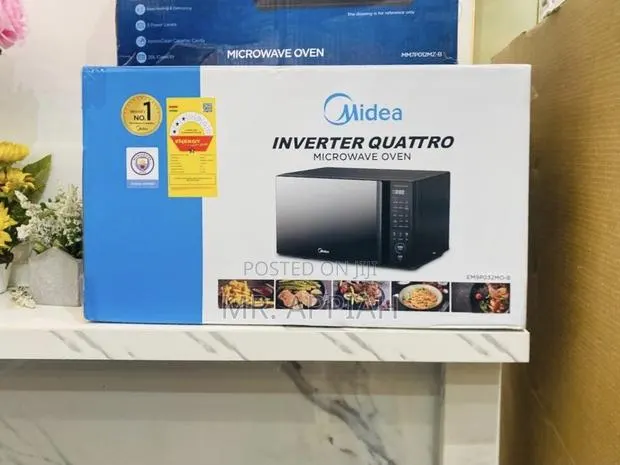 Efficient Midea 600Watt Electric Microwave(Glass) Black · Photo 1