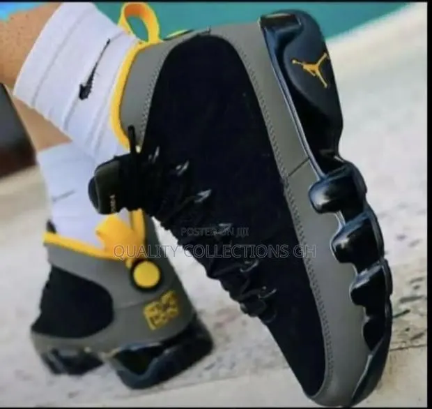 Jordan 9 Charcoal Black and Yellow · Photo 2