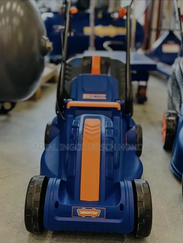 Battery Powered Lawn Mower · Photo 1