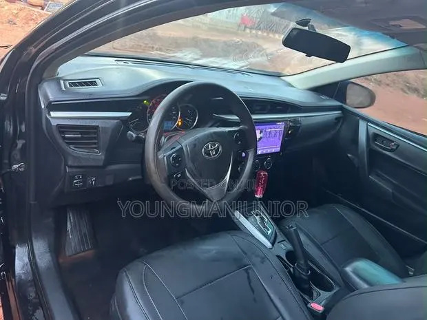 Toyota Corolla LE 4dr Sedan (1.8L 4cyl CVT) 2014 Black · Photo 1