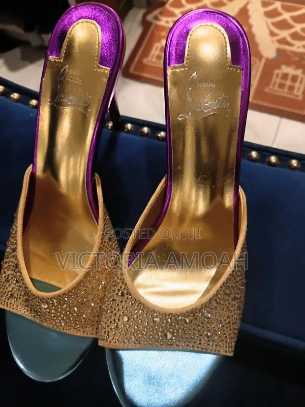 Pair of High - Heeled Mule Sandals · Photo 1