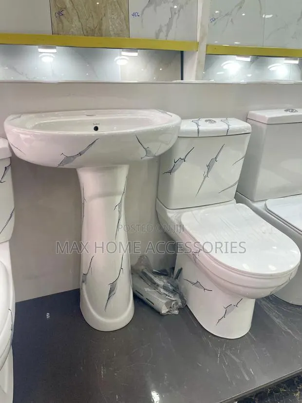 Marble Water Closet With Basin Black Spots · Photo 1