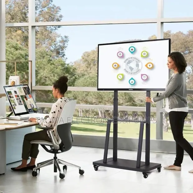Accommodating 32-75 Inch Universal Tv Stand · Photo 1