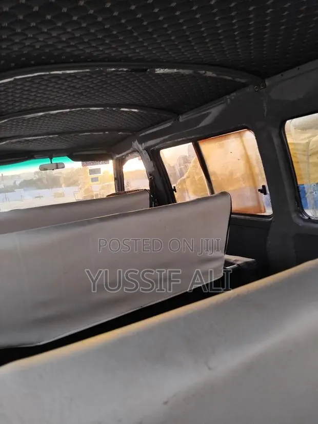 Nissan Caravan (Urvan) 2008 Grey · Photo 1