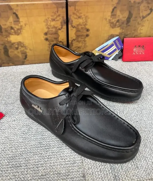 Wallabees Black Leather · Photo 1