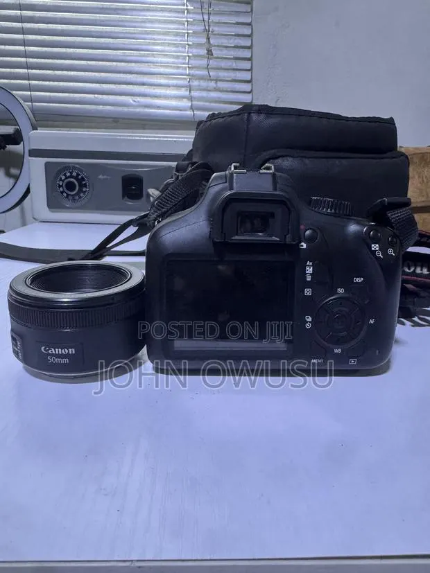 Used Canon 4000d With 55mm Prime Lens and Promate Bag. · Photo 1