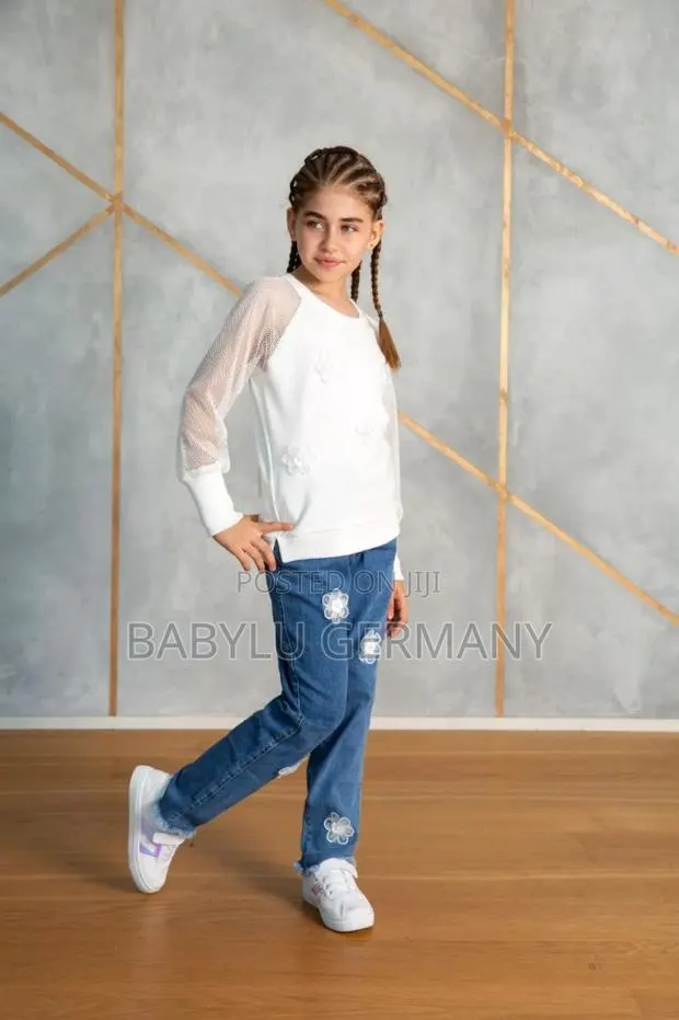 Premium White Sweater Blue Jeans for Girls. Floral Design · Photo 1
