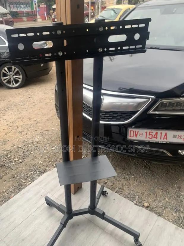 Newly in Stock Moveable Tv Trolly for 32”-70” Television. · Photo 1
