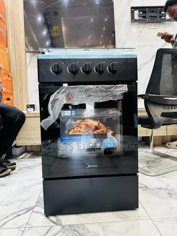 Spectacular Performance Midea Gas Cooker 50/50 4burner Oven Grill · Photo 1