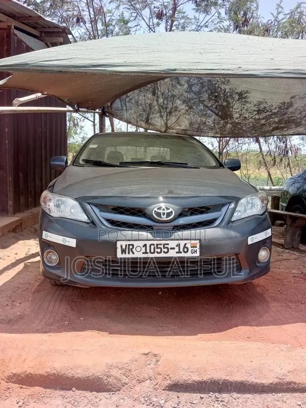 Toyota Corolla LE 4dr Sedan (1.8L 4cyl 4A) 2013 Blue · Photo 1