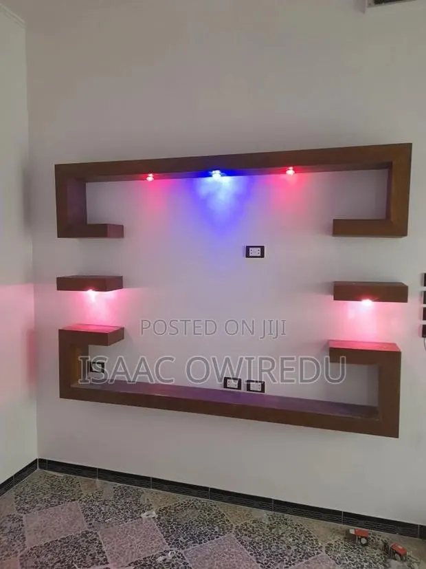 Television Wall Mounted Design With Colourful Lighting System · Photo 1
