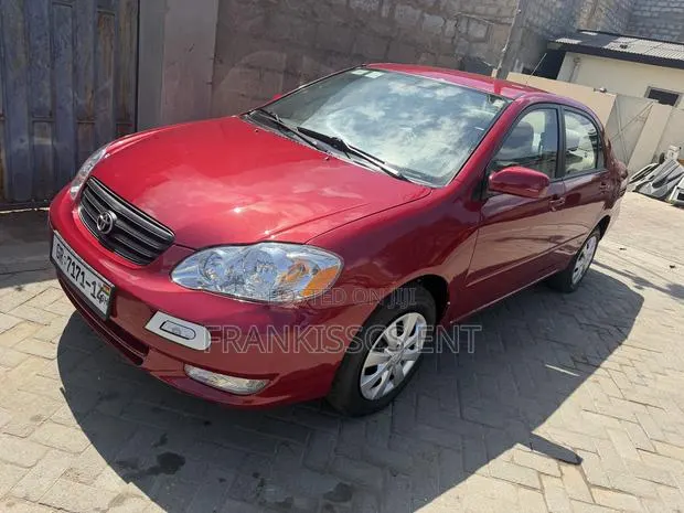 Toyota Corolla LE 2005 Red · Photo 1
