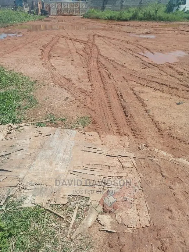 A 3 and Half Plot Spintex Main Road · Photo 1