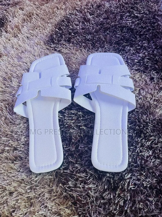 White Hermes-Style H-Strap Flat Sandals · Photo 1