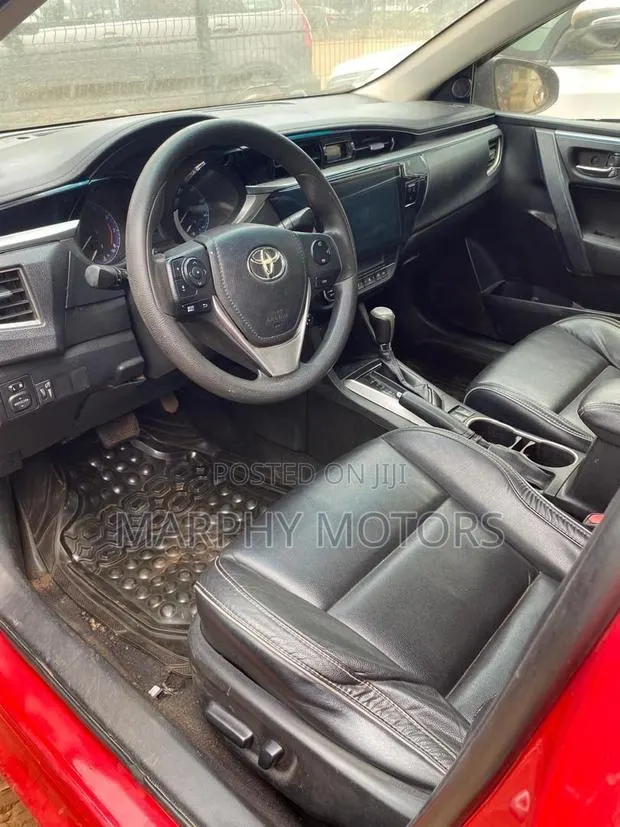 Toyota Corolla 2016 Red · Photo 1