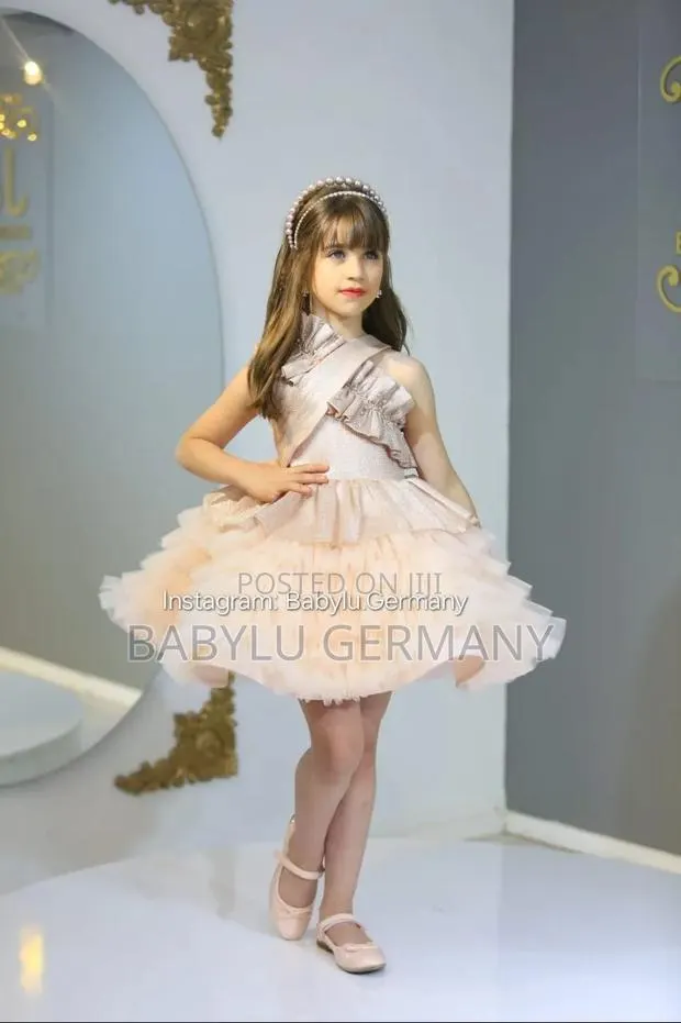 Champaigne Ballgown or Dress With Free Matching Hair Accessory · Photo 1