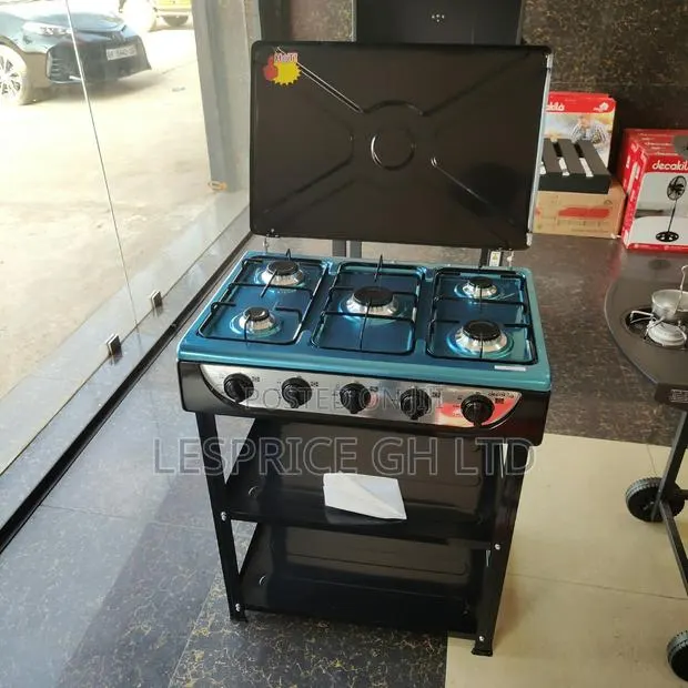 Save Money and Time With Our Solid 5 Burner Gas Stove With Shelf · Photo 1
