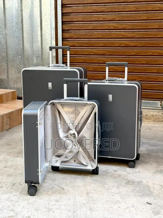 Hard-Shell Aluminum Trolley Suitcases Available as a Three-Piece Set. · Photo 1