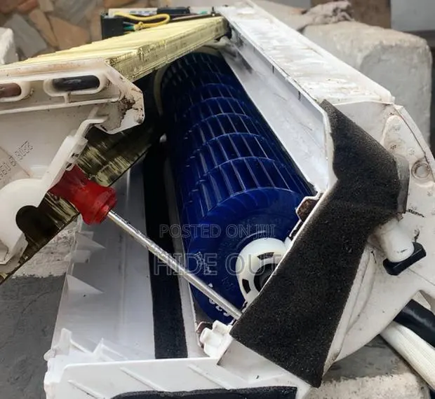 AC Installation and Servicing · Photo 1