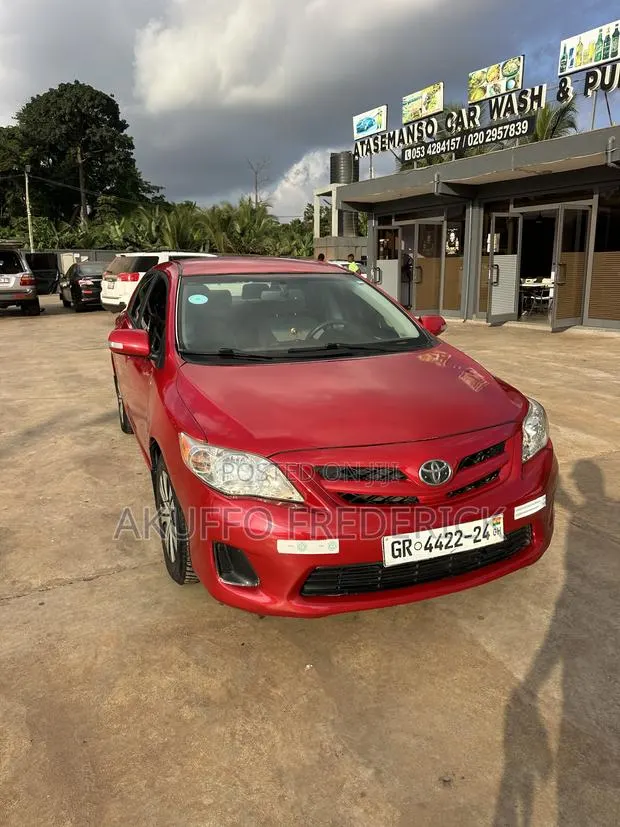 Toyota Corolla LE 4dr Sedan (1.8L 4cyl 4A) 2012 Red · Photo 1