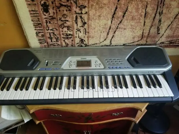 Casio CTK 491 Keyboard With an Adapter · Photo 1